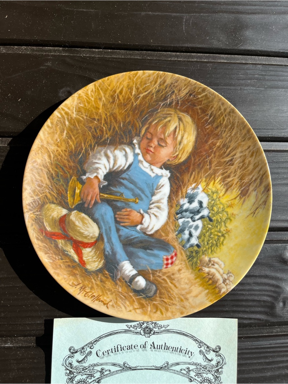 Mother goose seriesCollector's Decorative Plate with Sleeping Child Artwork
